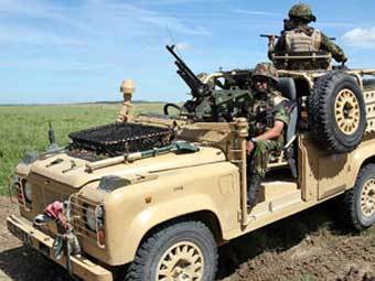 Snatch Land Rover  .    Sky News