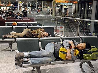    Fiumicino   Alitalia,     .  ©AFP