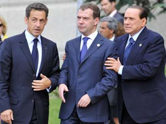       ()      G8  .  ©AFP